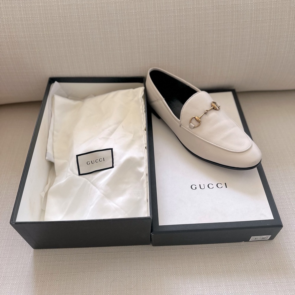White Gucci loafers